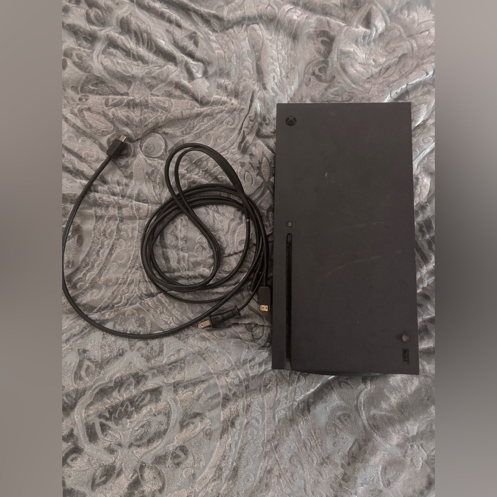 Black Gaming Console with Cables